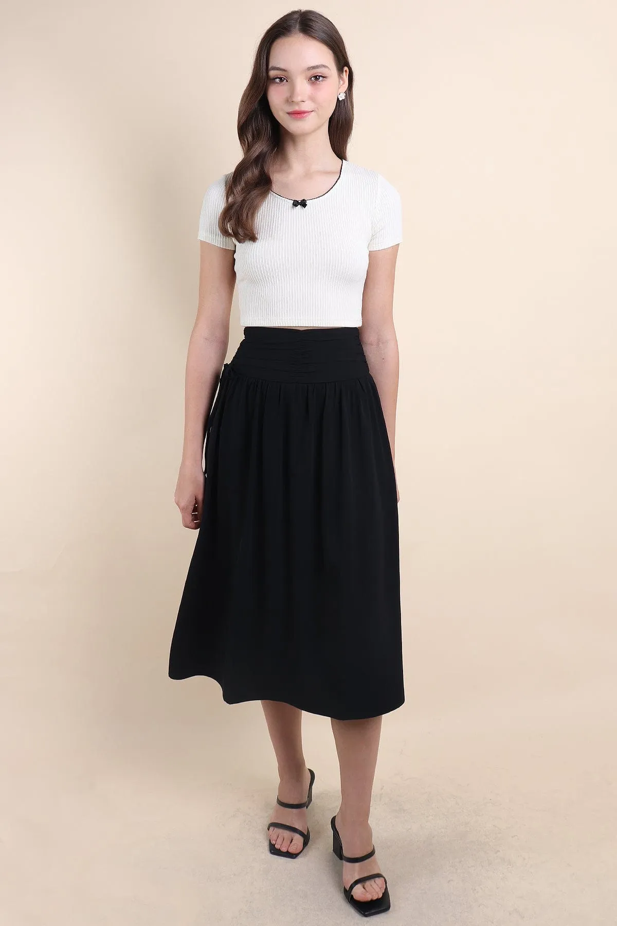 ADORA RUCHED MIDI SKIRT IN BLACK