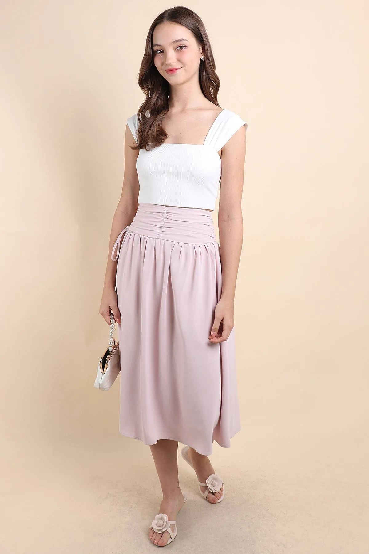 ADORA RUCHED MIDI SKIRT IN PINK