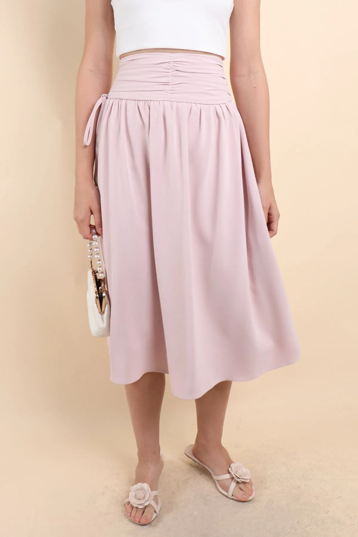 ADORA RUCHED MIDI SKIRT IN PINK